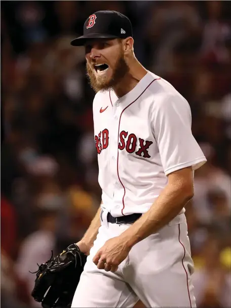  ?? NANCY LANE — BOSTON HERALD ?? Boston Red Sox starting pitcher Chris Sale reacts after striking out Houston Astros’ Kyle Tucker to retire the side during the 4th inning of the ALCS Game 5 at Fenway Park on Oct. 20, 2021 in Boston.