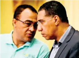  ?? FILE ?? Health and Wellness Minister Dr Christophe­r Tufton (left) and Prime Minister Andrew Holness.