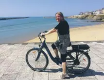  ??  ?? The harbour at Les Gilles, main; Bernadette Fallon getsback on a bike, above