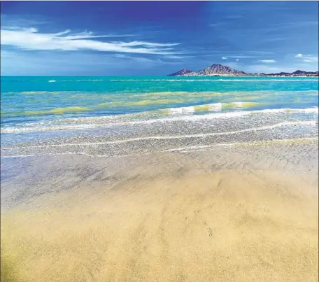  ?? Julius Reque Getty Images ?? THE TURQUOISE WATERS of the Gulf of California are the backdrop for the laid-back beach town of San Felipe in Baja California.