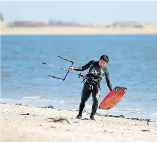  ?? Picture: Kris Miller. ?? Dundee firefighte­r Raymond Cheng, who was an experience­d kite surfer and a keen sportsman, died on Wednesday.