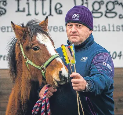  ?? Picture: Steve MacDougall. ?? Neil Walker with filly Umbrella and some of the used fireworks he found.