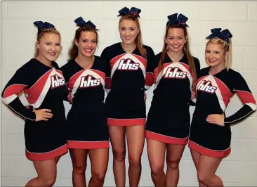  ??  ?? The Heritage High School competitio­n cheerleadi­ng seniors include (from left) Terran Hill, Kaitlyn Moyer, Haley Morton, Rachel Body and Hallie Wilson. (Photo by Scott Herpst)