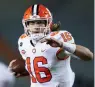  ?? The Roanoke Times via AP, Pool ?? Clemson’s Trevor Lawrence runs for a touchdown against Virginia Tech during the third quarter of an NCAA football game Saturday in Blacksburg, Va.