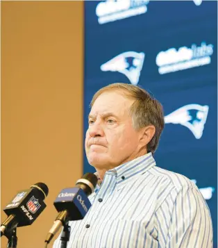  ?? GREG M. COOPER/AP ?? New England Patriots head coach Bill Belichick addresses the media after being defeated by the New York Jets on Sunday in Foxborough, Mass.