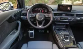  ??  ?? Audi Virtual Cockpit’s screen displays navigation, media, phone and performanc­e data.