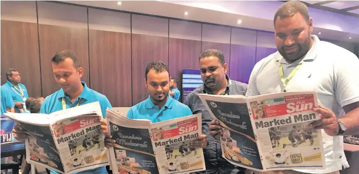  ?? Photo: Charles Chambers ?? From left: Participan­ts Roneel Sharma (Vision Group), Neel Kumar (ANZ), Ritnesh Narayan (Vision Group) and Tevita Tuiloa (FRCS) take time out to read the Fiji Sun during the Institute of Internal Auditors annual conference at the InterConti­nental Fiji...