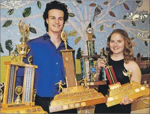  ?? ERIC MCCARTHY/JOURNAL PIONEER ?? Diego LeClair and Maddie Thibodeau were named the 2017 Heart of the Wolverine award-winners at Westisle Composite High School’s annual Athletic Awards Banquet. LeClair also picked up a special award for sportsmans­hip.