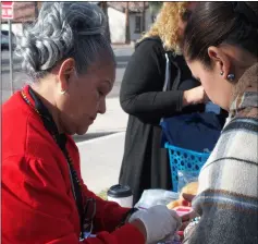  ?? PHOTO ANDY VELEZ ?? Cecilia Cota (left), community health worker for Clinicas de Salud del Pueblo checks iris robles’ glucose levels early Friday morning in Calexico. Clinicas provided free glucose level checks and informatio­n on what could cause the levels to fluctuate.