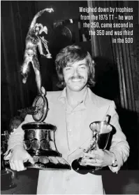  ??  ?? Weighed down by trophies from the 1975 TT – he won the 250, came second in the 350 and was third in the 500