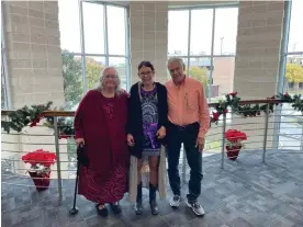  ?? ?? Melissa Highsmith, middle, is flanked by her mother Alta Atapenco and father Jeffrie Highsmith. Photograph: Courtesy of Highsmith family