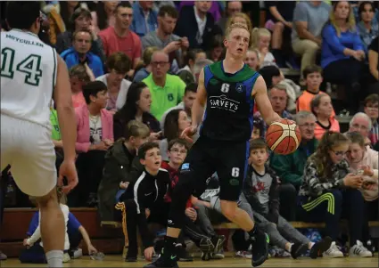  ??  ?? Garveys Tralee Warriors team captain Darren O’Sullivan (black) who scored a three-point basket on the buzzer to clinch a victory for this team against Moycullen in Tralee Sports Complex last Saturday night. Photo by Domnick Walsh