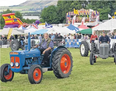  ?? Picture: Ron Stephen. ?? The tractor parade is always a popular attraction at Kinross Show.