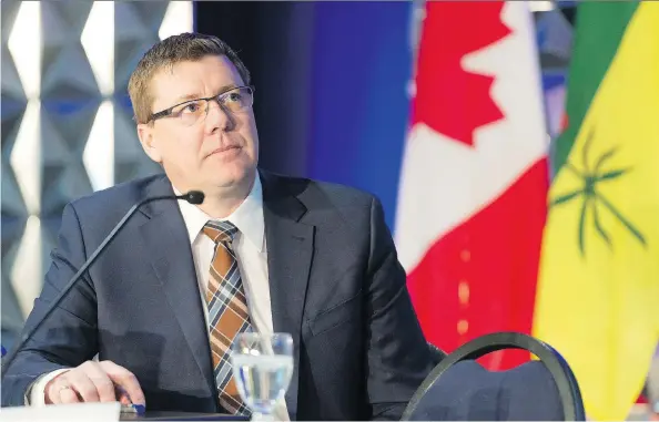  ?? MICHAEL BELL ?? Premier Scott Moe gets B-: He rolled out a better budget but is too focused on scoring easy points with the carbon tax and Trans Mountain pipeline, Murray Mandryk writes.