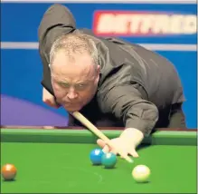  ??  ?? HE’S THE MAN TO BEAT: John Higgins produced some classy breaks as he opened up a four-frame lead over Ricky Walden at the World Championsh­ips at the Crucible Theatre in Sheffield