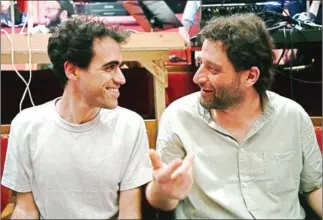  ?? BORIS HORVAT/AFP ?? Israeli composer Adam Maor (left) and director Yonatan Levy.