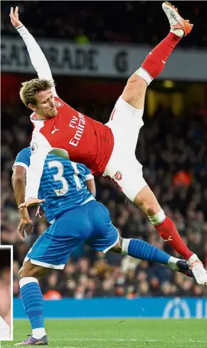  ??  ?? Gunning for me?: Arsenal’s Nacho Monreal colliding with Bournemout­h’s Lys Mousset in the English Premier League match at the Emirates yesterday. Inset: Alexis Sanchez celebrates after scoring in Arsenal’s 3-1 win. — Reuters / AP