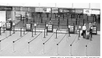  ?? STEPHEN M. DOWELL/ORLANDO SENTINEL ?? A screening area is deserted Tuesday at Orlando Internatio­nal Airport.