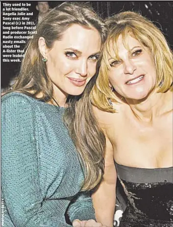  ??  ?? They used to be a lot friendlier. Angelia Jolie and Sony exec Amy Pascal (r.) in 2011, long before Pascal and producer Scott Rudin exchanged nasty emails about the A-lister that were leaked this week.