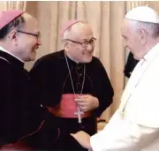  ??  ?? Pope Francis greets brothers Archbishop Osbaldo Padilla and Archbishop Francisco Padilla.