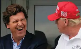  ?? ?? Tucker Carlson and Donald Trump at the Bedminster Invitation­al LIV golf tournament in July 2022. Photograph: Seth Wenig/AP