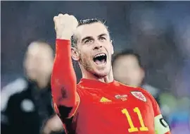  ?? BaTTHEW CHELDS / REUTERS ?? Gareth Bale celebrant el triomf contra Àustria dijous