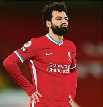  ?? Foto: ČTK ?? Pro Mohameda Salaha a jeho spoluhráče není tato sezona podle gusta. Liverpool z dosavadníc­h 23 zápasů Premier League ovládl jen jedenáct.