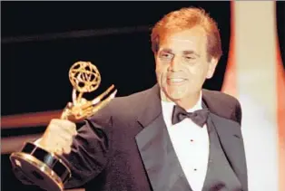  ?? Nick Ut Associated Press ?? EMMY WINNER In 1990, Alex Rocco won the award for best supporting actor in a television comedy series for his
role as a smarmy talent agent in the short- lived sitcom “The Famous Teddy Z.”