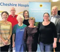  ??  ?? Volunteers and staff of East Cheshire Hospice commit to becoming Dementia Friends