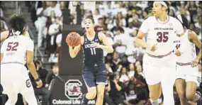  ?? Associated Press file photo ?? UConn’s Kia Nurse, center, was named the AAC Defensive Player of the Year.