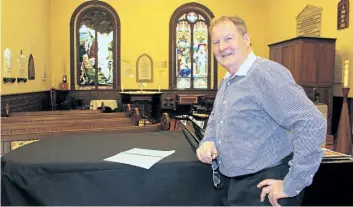 ?? PENNY COLES/SPECIAL TO THE STANDARD ?? Michael Tansley is retiring from his role as music director for St. Mark's Anglican Church in Niagara-on-the-Lake, but not before one final Christmas concert for which he has chosen music that he would like to play.