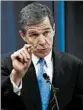  ?? CHRIS SEWARD/ THE (RALEIGH, N.C.) NEWS & OBSERVER ?? Roy Cooper says he’ll take legal action against laws he considers unconstitu­tional.