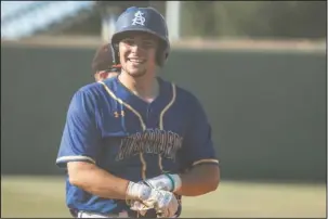  ?? Submitted photo ?? MAGNOLIA IMPRESSION: Southern Arkansas redshirt sophomore catcher Zach Muldoon looks to the sideline after reaching third base during the Muleriders’ 11-5 win over St. Cloud State on May 19 in the Magnolia Regional at Walker Stadium at Goodheart Field....