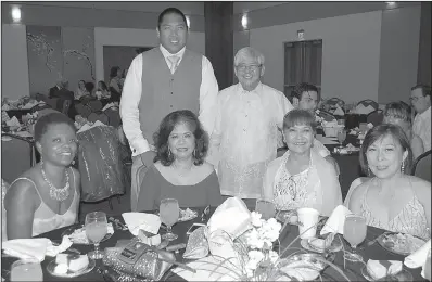  ??  ?? Steevan Novero and Primo Novero of Russellvil­le (standing) with Alexis Agginie (seated, from left), Gloria Kincaid, Gerrie Novero of Russellvil­le and Lita Novero