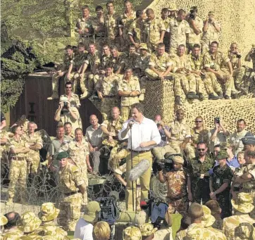  ?? GETTY IMAGES ?? Not the full story: Tony Blair addressing British Troops in October 2001