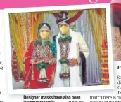  ?? PHOTO: PTI ?? Designer masks have also been in vogue recently ride and groom wear masks during their wedding