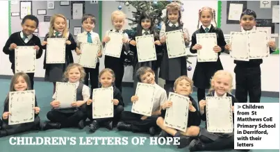  ??  ?? Children from St Matthews CoE Primary School in Derriford, with their letters