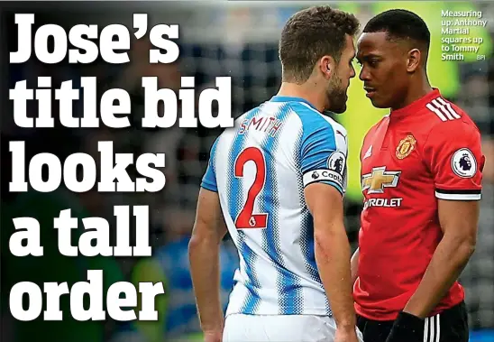  ?? BPI ?? Measuring up: Anthony Martial squares up to Tommy Smith