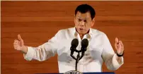  ?? Reuters ?? Duterte gestures during his first state of the nation address at the philippine Congress in Quezon city, manila, on monday. —