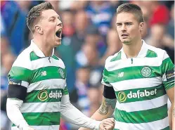  ??  ?? Callum McGregor, left, celebrates after scoring Celtic’s opening goal in the win over Rangers.