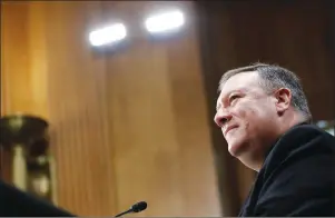  ?? AP PHOTO ?? Secretary of State-designate Mike Pompeo listens during the Senate Foreign Relations Committee hearing on his confirmati­on Thursday.