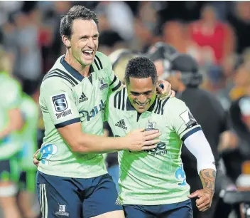  ?? Picture: MICHAEL BRADLEY/GETTY IMAGES ?? JOB WELL DONE: The Otago Highlander­s’ Ben Smith, left, and Aaron Smith celebrate during their victory over Waikato Chiefs in Hamilton, New Zealand on Friday.