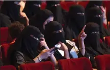  ?? AFP ?? Women attend October’s Short Film Competitio­n 2 festival at King Fahad Cultural Centre in Riyadh