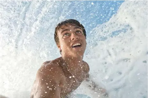  ?? (Kauli Vaast via AP) ?? In this undated screen grab, Tahitian-born surfer Kauli Vaast films himself surfing on the world-famous Teahupo’o wave in Tahiti. The 21-year-old is among athletes qualified for the Olympic surfing competitio­n that will be held next July at Teahupo’o, as part of the 2024 Summer Games in Paris.”