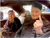  ?? — PTI ?? Himachal Pradesh Chief Minister Virbhadra Singh shows his inked finger after casting his vote at a polling both, in Rampur on Thursday.