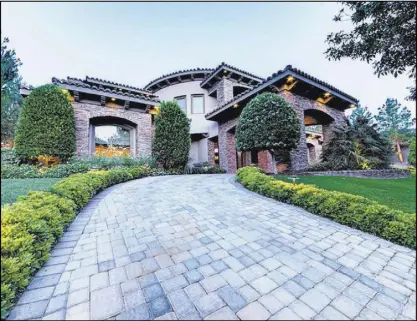  ??  ?? MGM Resorts Internatio­nal executive Bobby Baldwin has placed his Southern Highlands home on the market for $6.25 million.