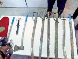  ??  ?? The weapons that were recovered