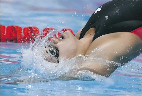  ?? CHRISTOPHE SIMON/AFP/GETTY IMAGES ?? Canada’s Kylie Masse put up the fastest time in the 100m backstroke semifinals Monday, setting a new Canadian record in the process, at the 2017 FINA World Championsh­ips in Budapest, Hungary. The native of LaSalle swims for a gold medal Tuesday.