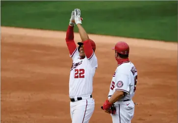  ?? ASSOCIATED PRESS ?? Washington Nationals’ Juan Soto (22) reacts at first after his single during the second inning of a baseball game against the New York Mets, Sunday, Sept. 27, 2020, in Washington.