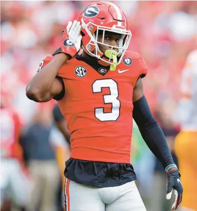  ?? TODD KIRKLAND/GETTY ?? Georgia’s Kamari Lassiter reacts after a play during the second quarter against Tennessee on Saturday at Sanford Stadium in Athens, Georgia.